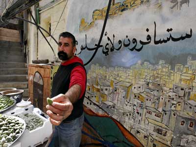 فلسطينيو لبنان يفضلون الهجرة على التوطين